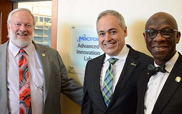 Mason officials outside of new lab sponsored by Micron.